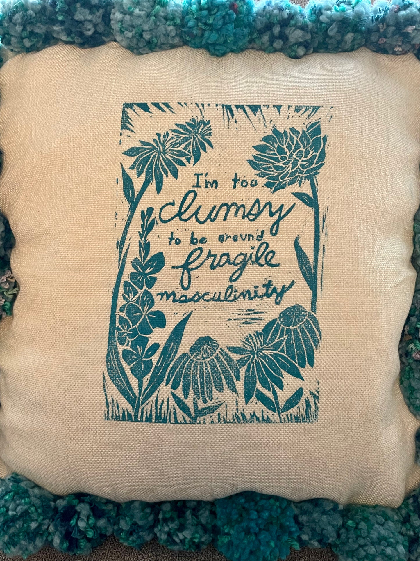 Fragile Masculinity Hand-Printed Teal Pillow with Handmade Pom-Poms