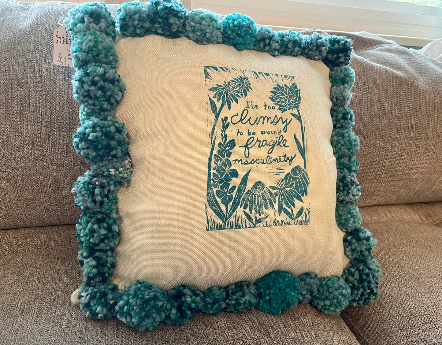 Fragile Masculinity Hand-Printed Teal Pillow with Handmade Pom-Poms