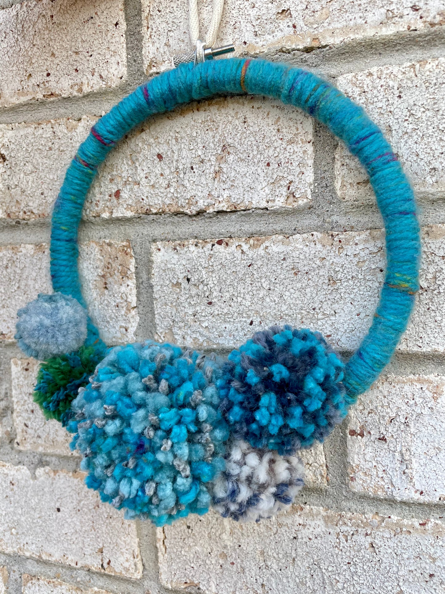 Festive Blue Pom-Pom Wreath