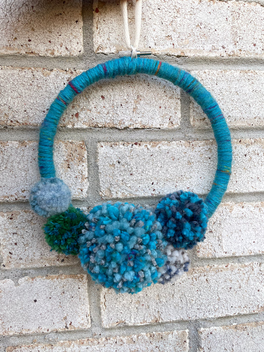Festive Blue Pom-Pom Wreath