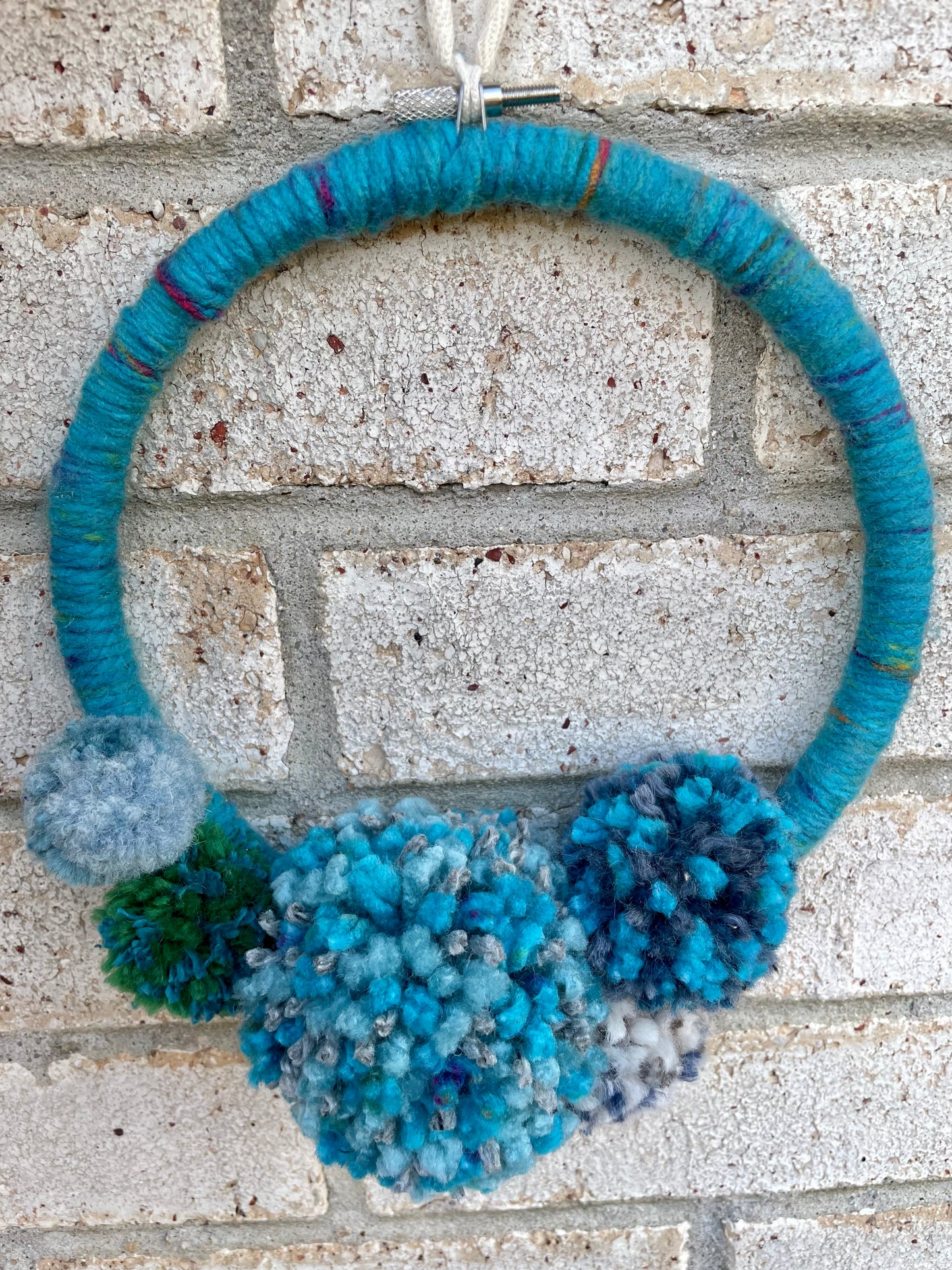 Festive Blue Pom-Pom Wreath